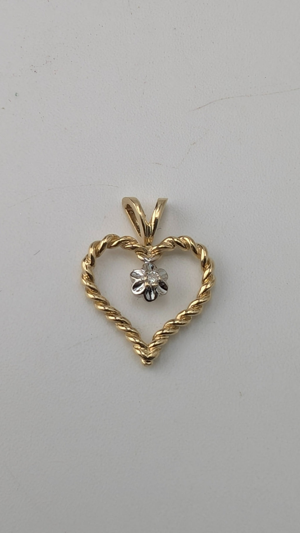 10K Yellow Gold Twisted Heart Pendant with Diamond Accent