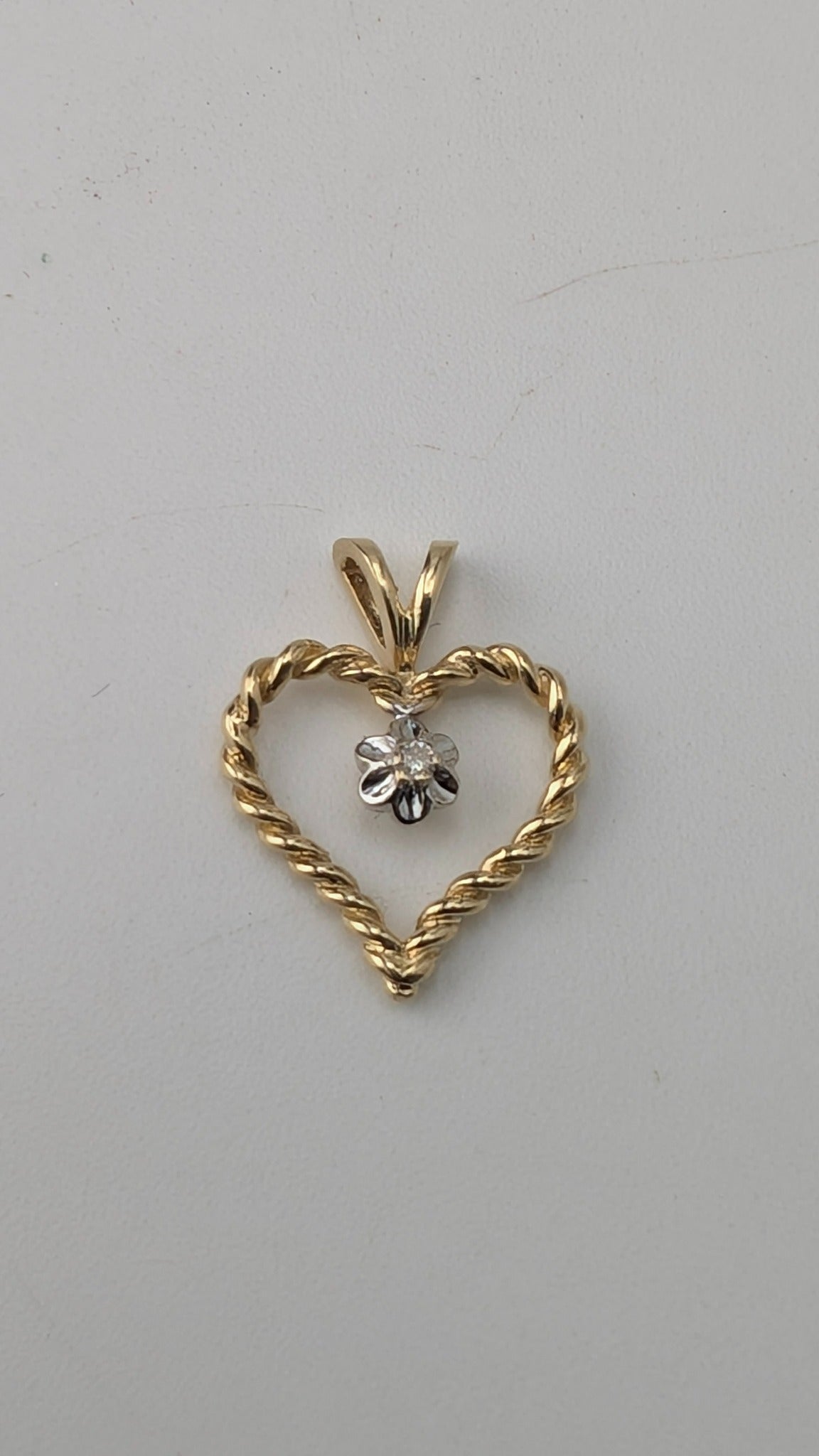 10K Yellow Gold Twisted Heart Pendant with Diamond Accent