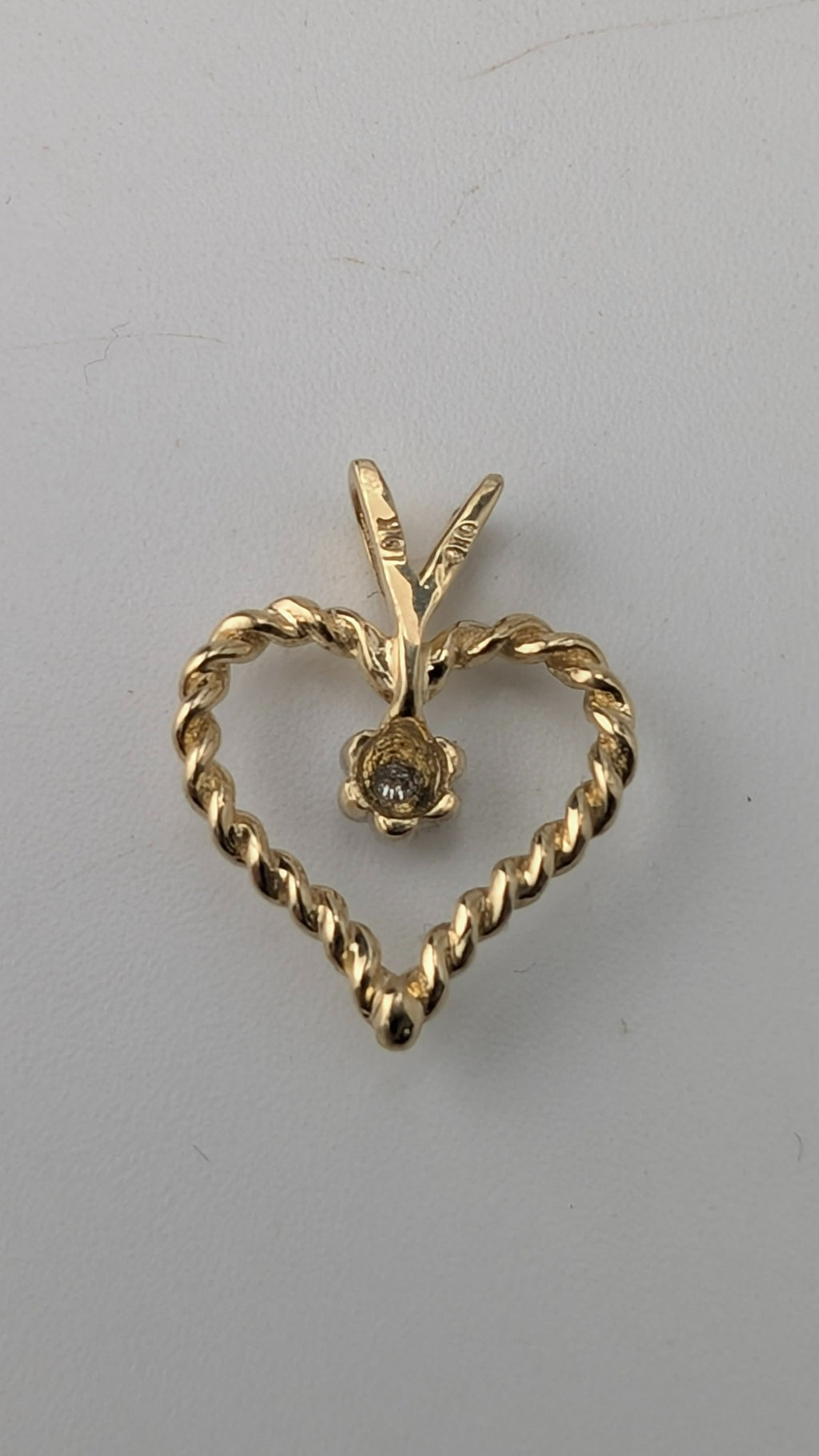 10K Yellow Gold Twisted Heart Pendant with Diamond Accent
