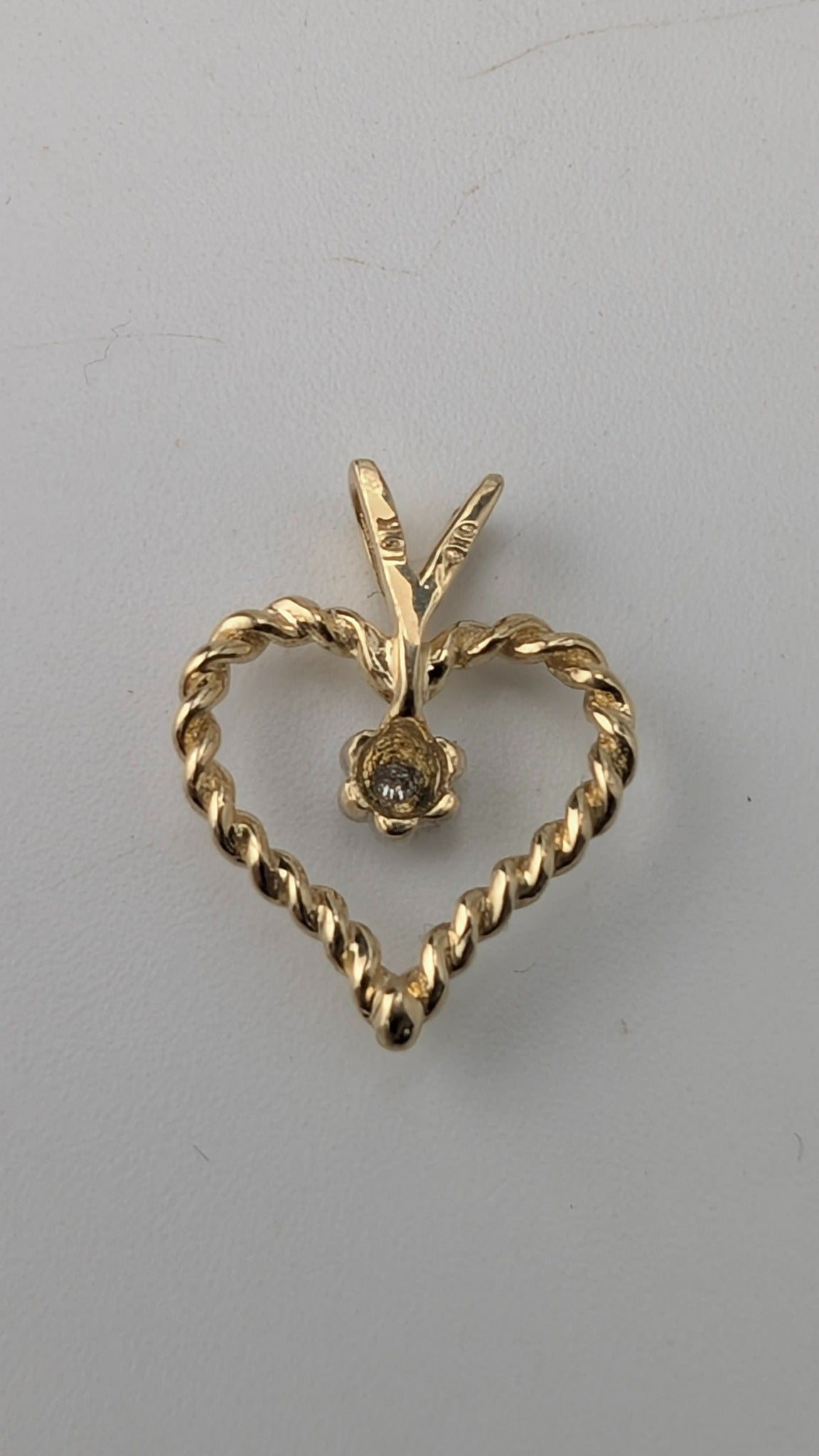 10K Yellow Gold Twisted Heart Pendant with Diamond Accent