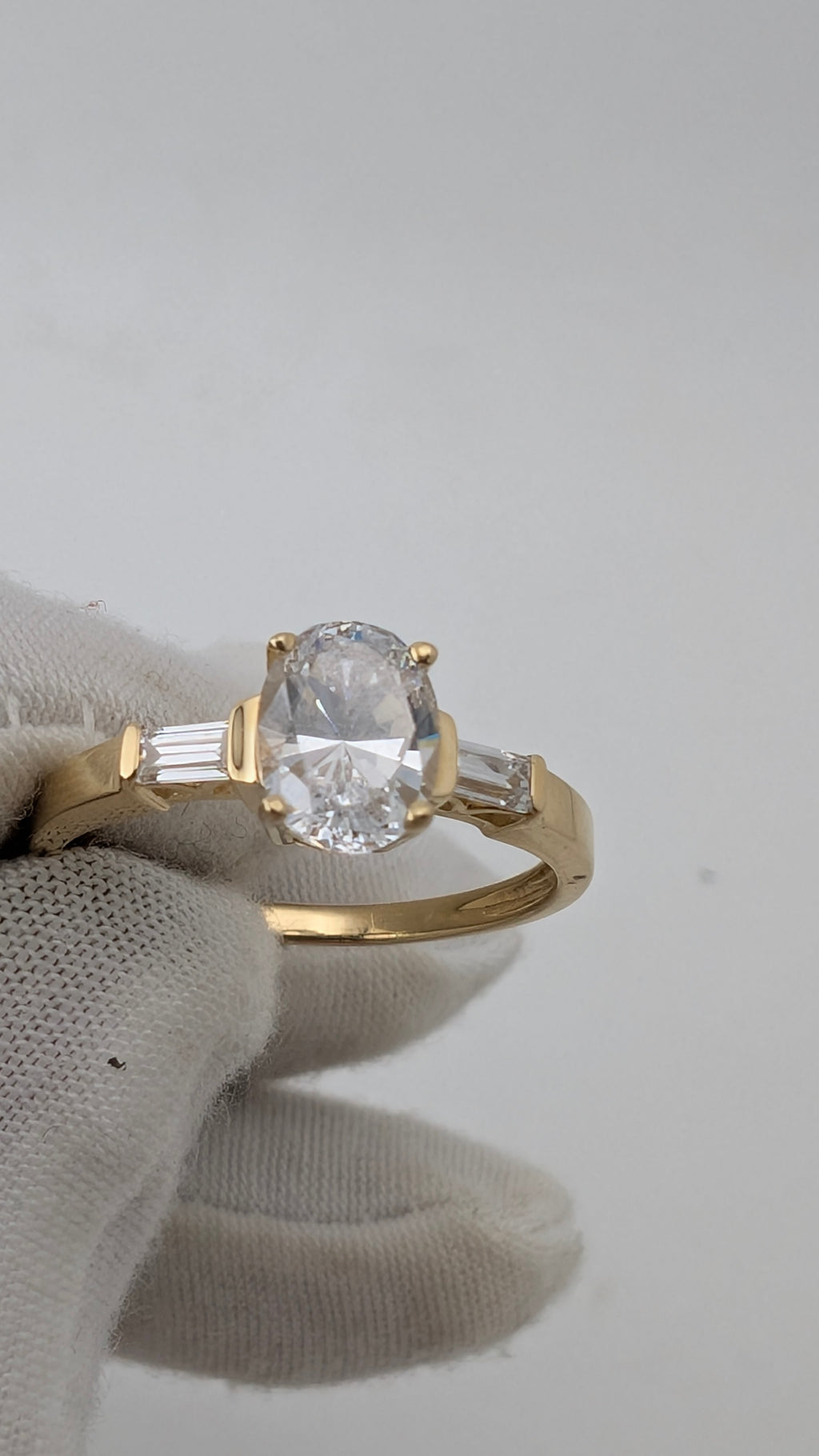 14K Yellow Gold Three-Stone Ring – Oval Simulated Diamond & Baguette Accents