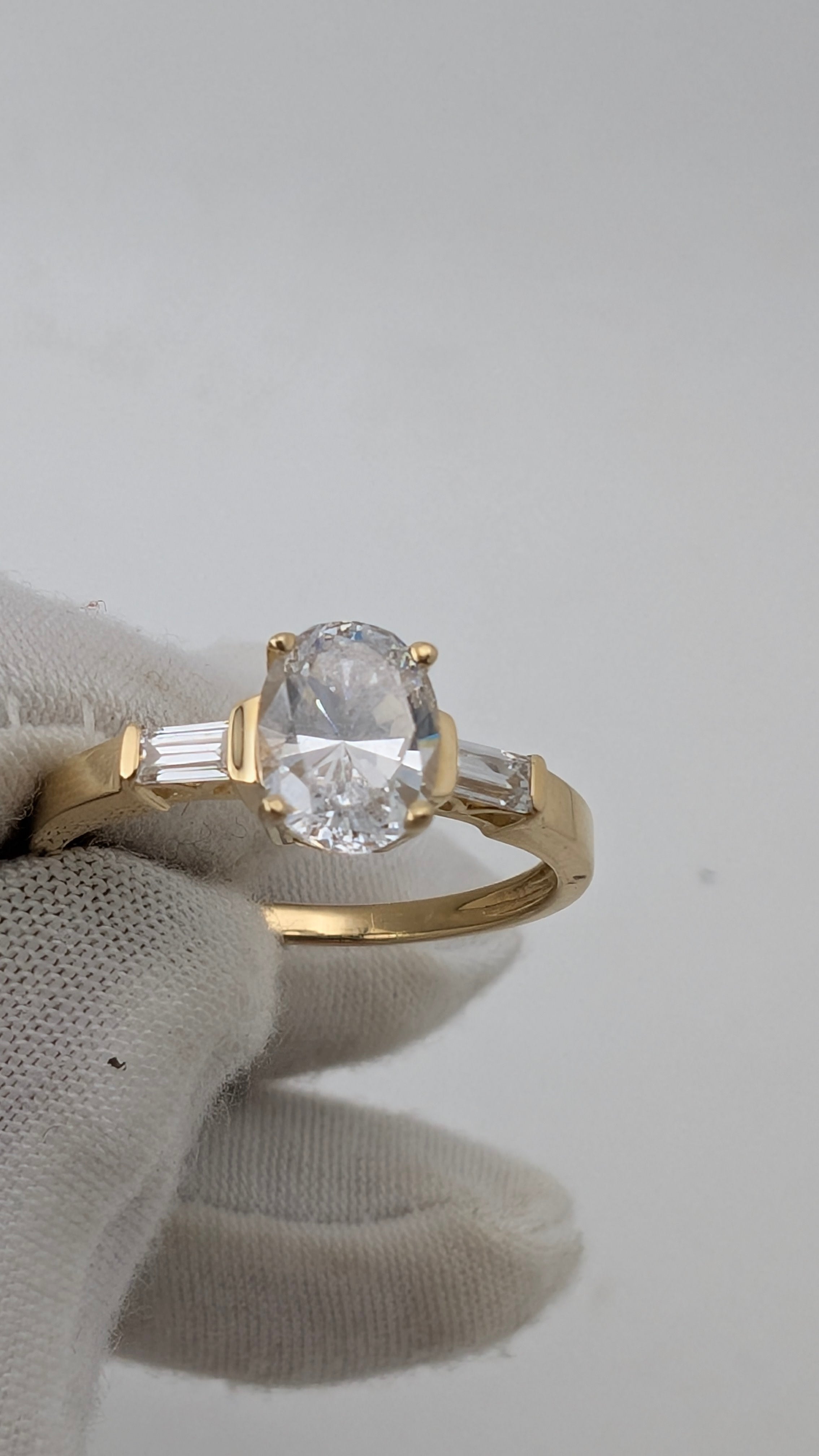 14K Yellow Gold Three-Stone Ring – Oval Simulated Diamond & Baguette Accents