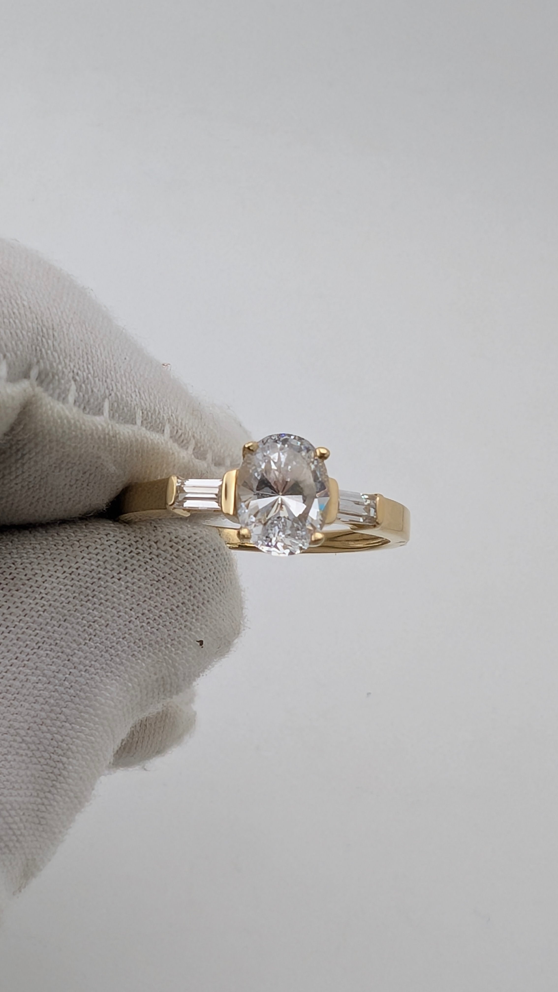 14K Yellow Gold Three-Stone Ring – Oval Simulated Diamond & Baguette Accents